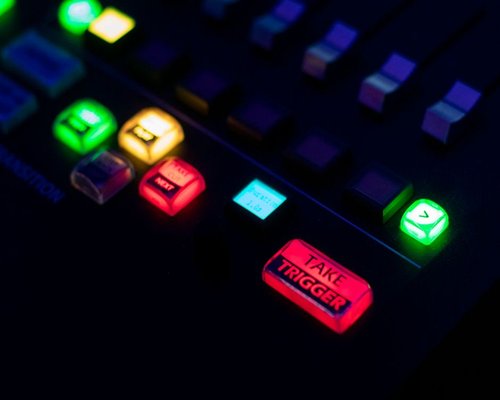 Console demonstration station illuminated in a dark room