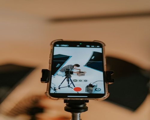 Smartphone presenting a fictional beginner-friendly gaming demonstration